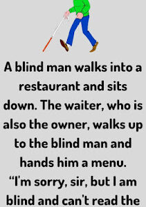 A blind man walks into a restaurant and sits down. 