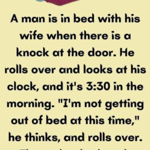 A man is in bed with his wife.