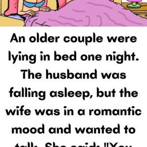 A older couple were lying in bed