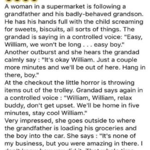 A woman in a supermarket is following a grandfather and his abdly-behaved grandson..